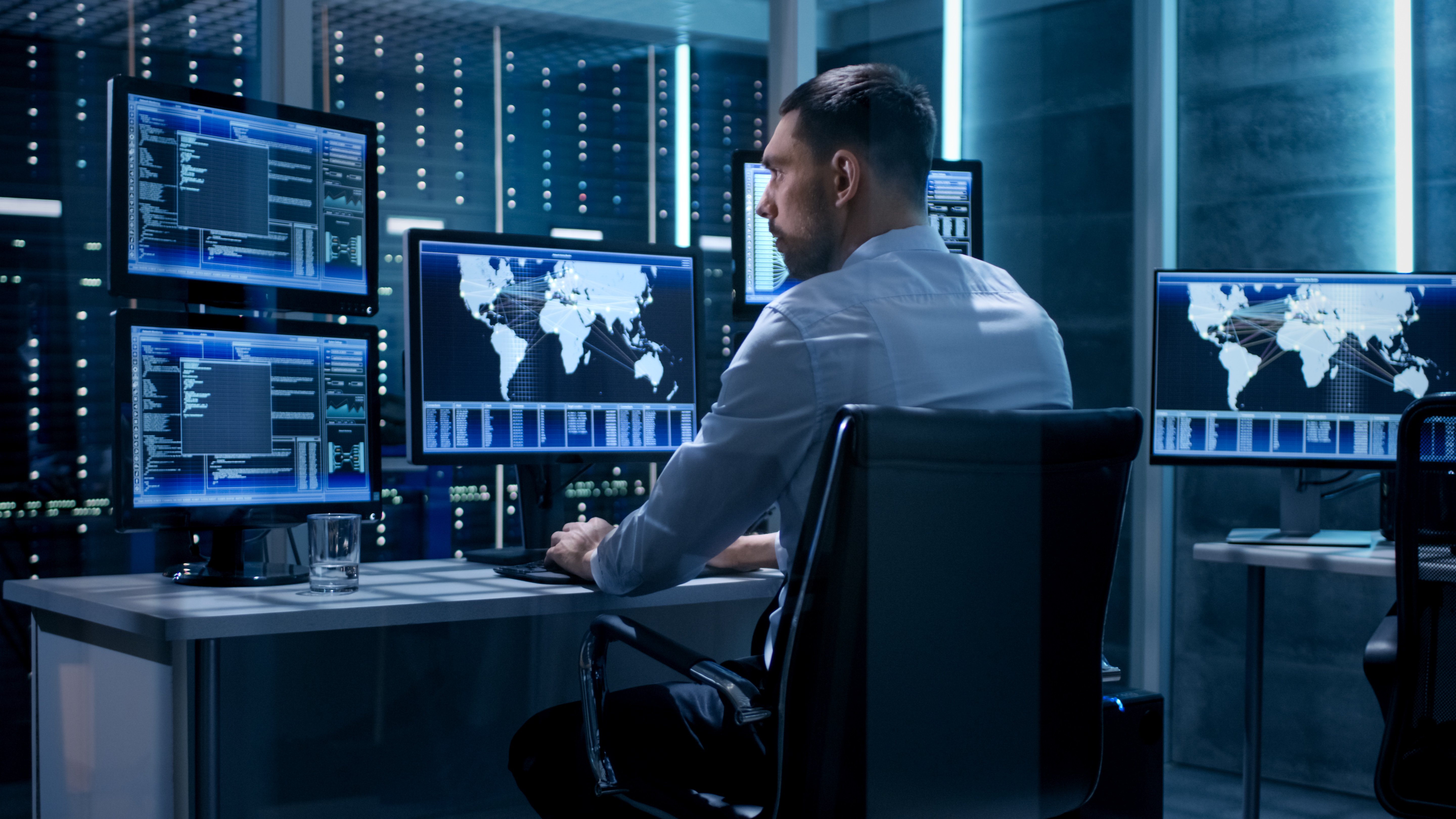 Technical Controller Working at His Workstation