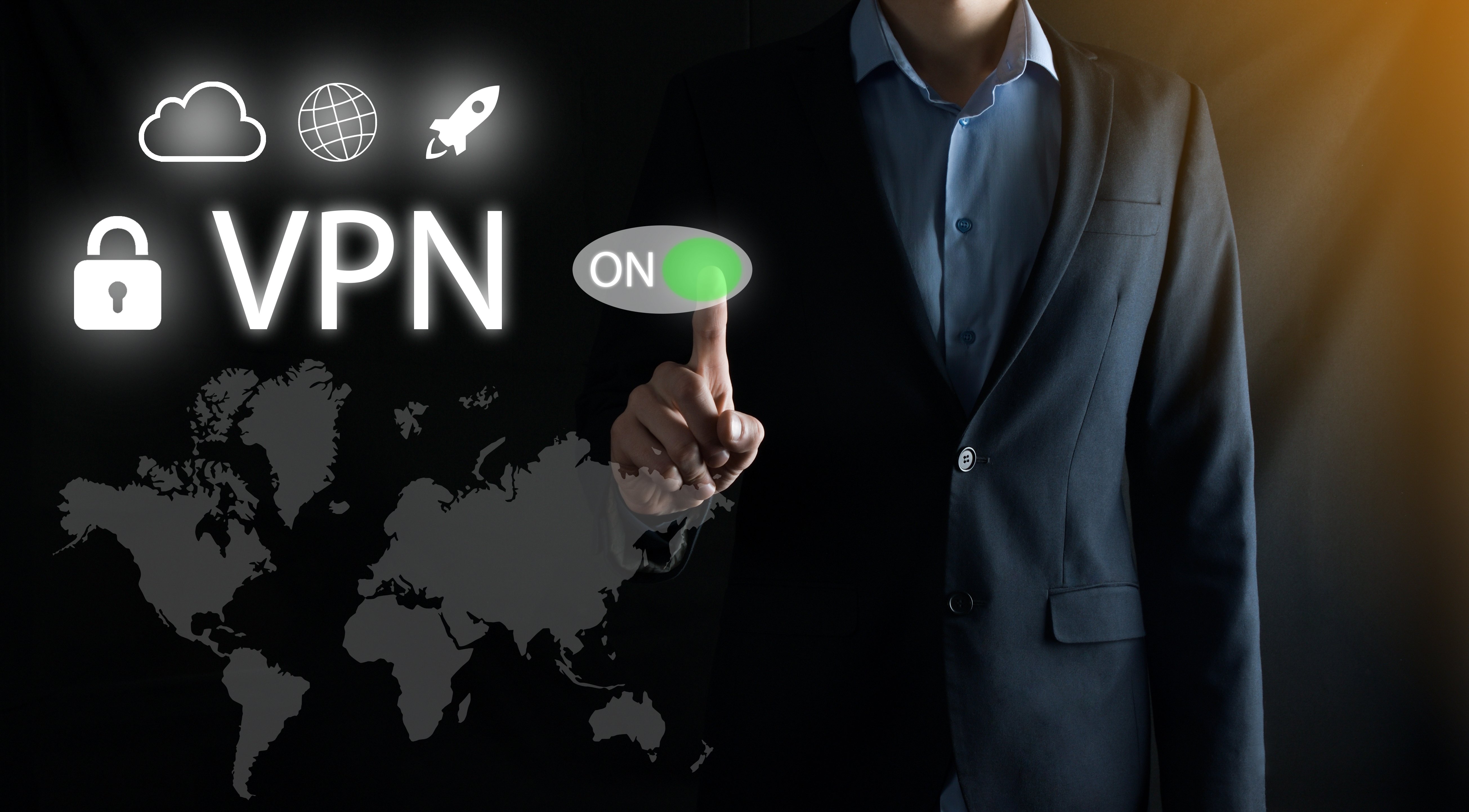 Young businessman working on a virtual screen of the future and presses the power button vpn.